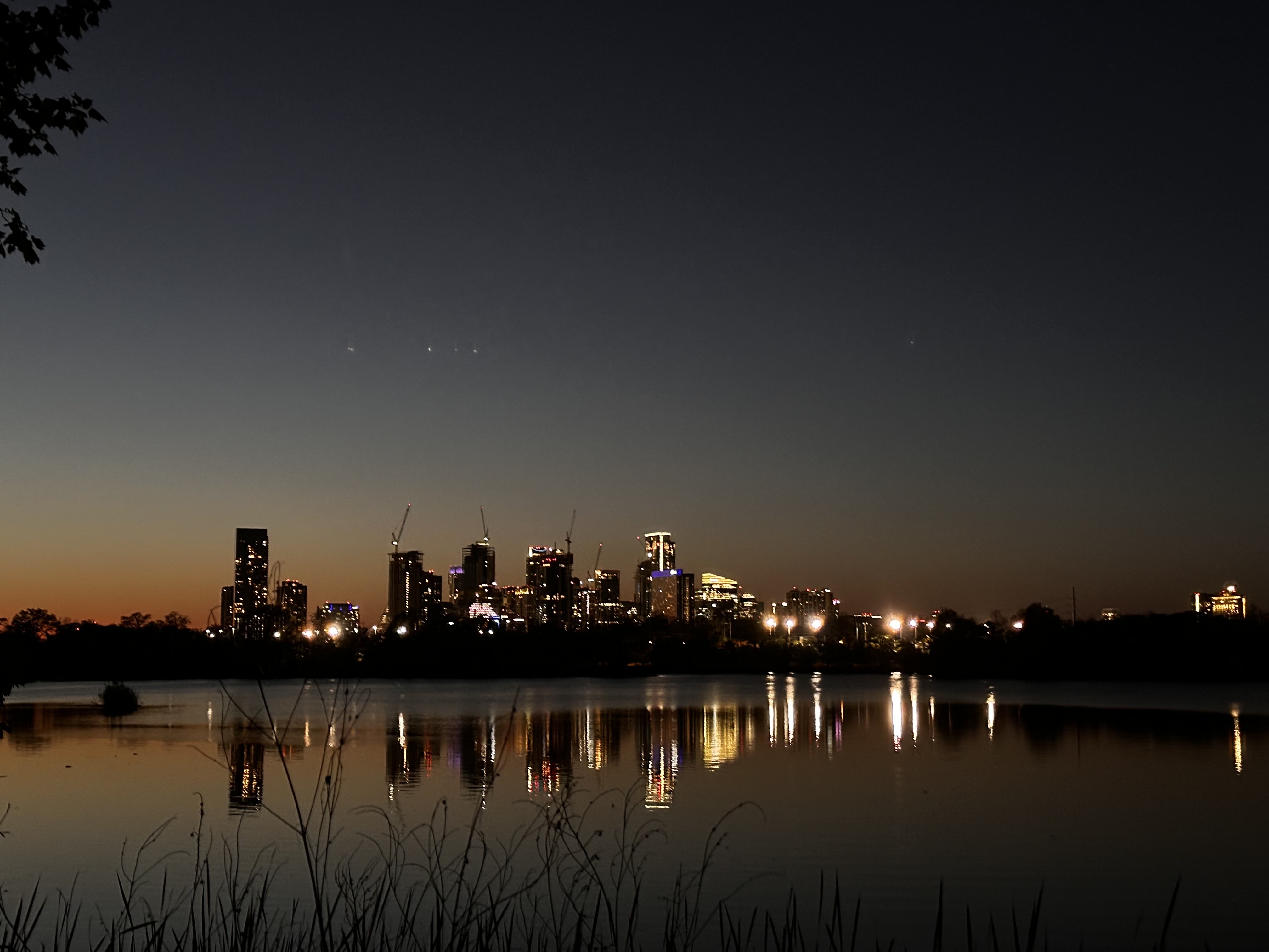 Xiomara Romero with Austin skyline at golden hour